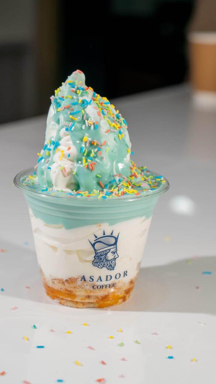 Bubble gum flavored soft ice cream with colorful sprinkles